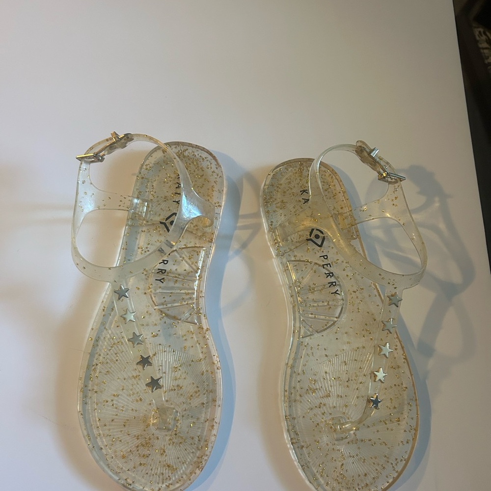 Katy Perry  Collections Clear and gold jelly sandals - size 6.5